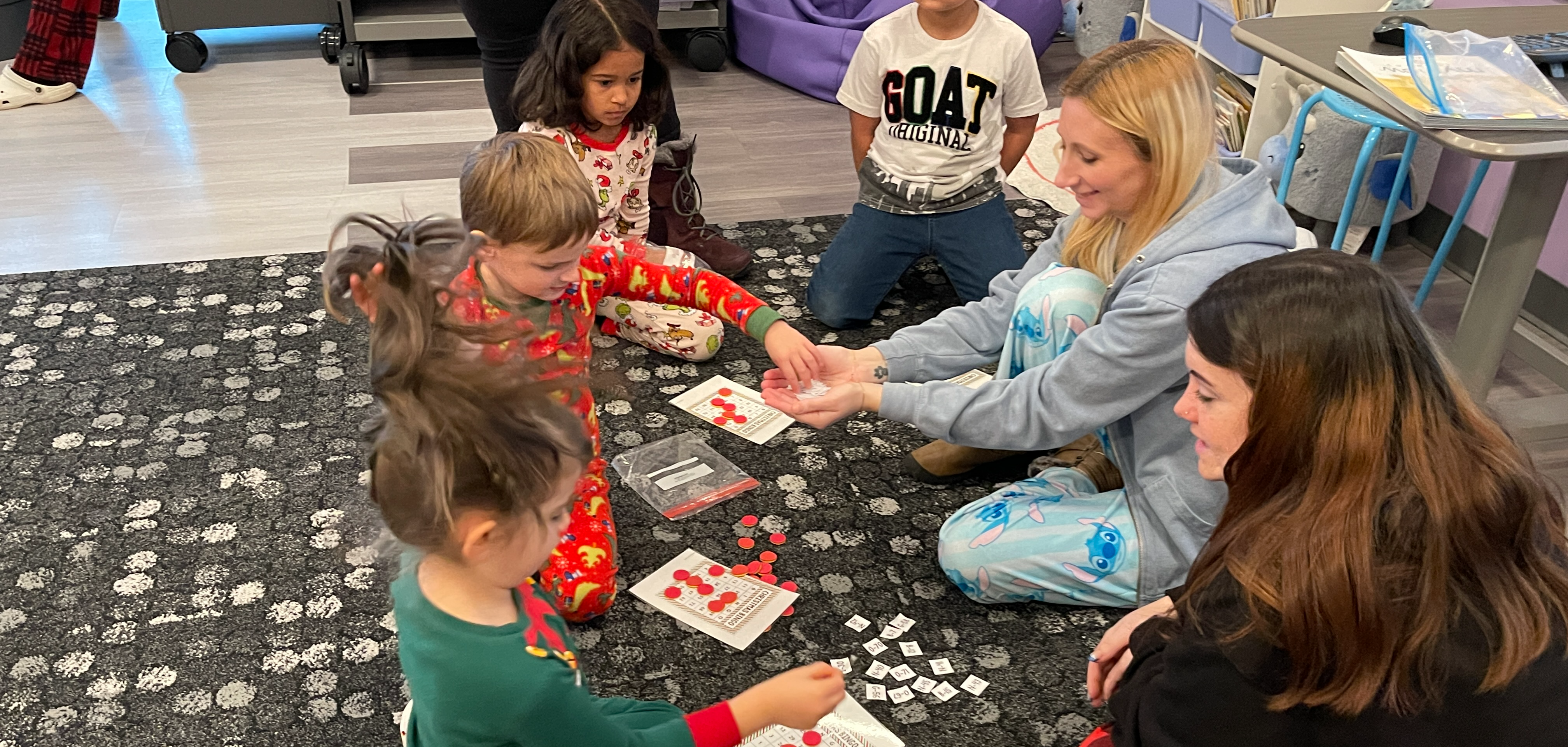 students play game on rug