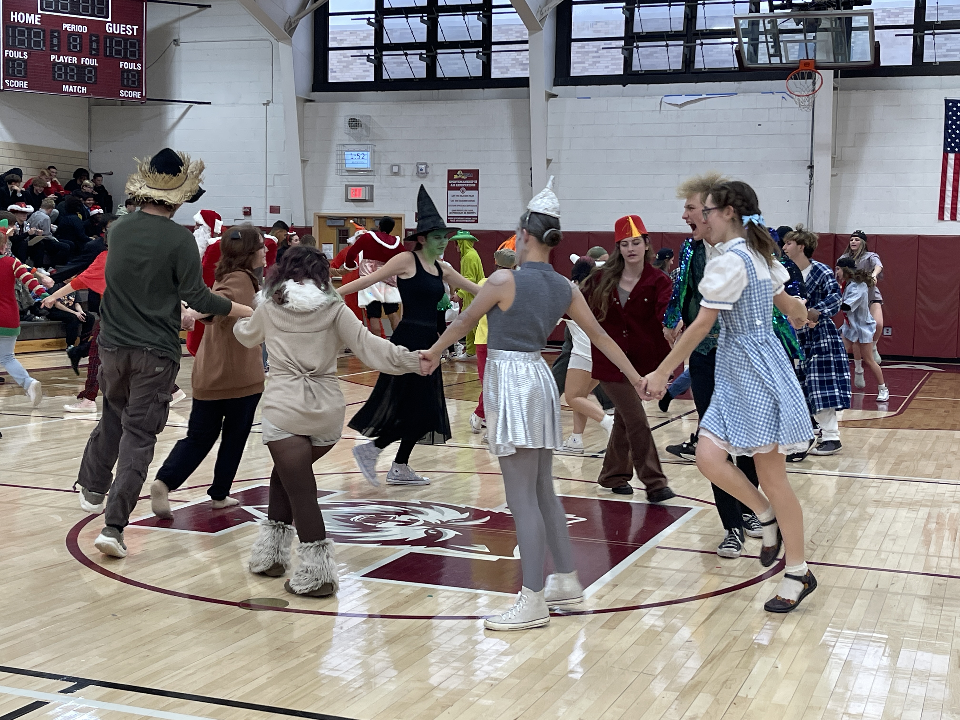 students dressed in wizard of oz participating in square dance competition
