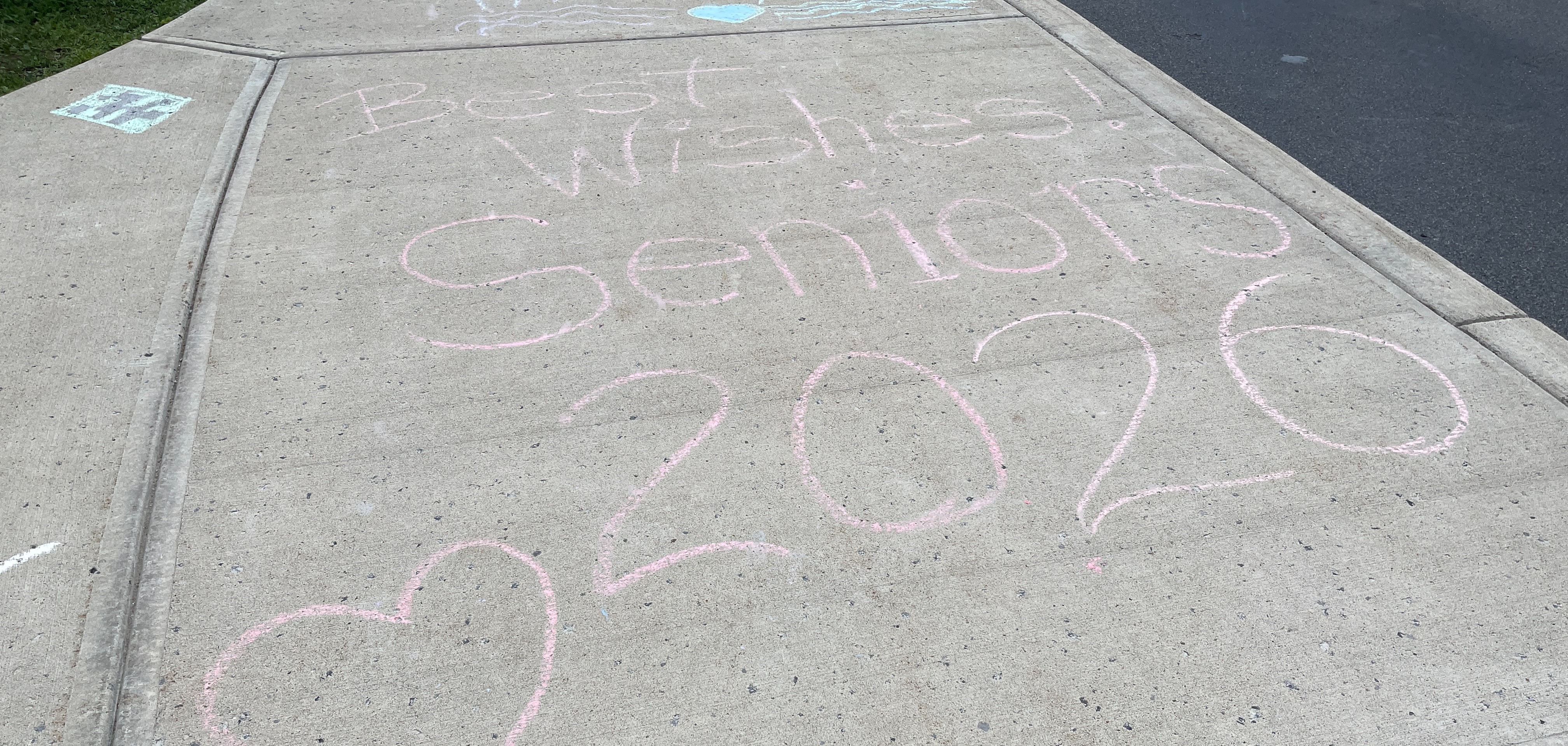 class of 2026 written on sidewalk