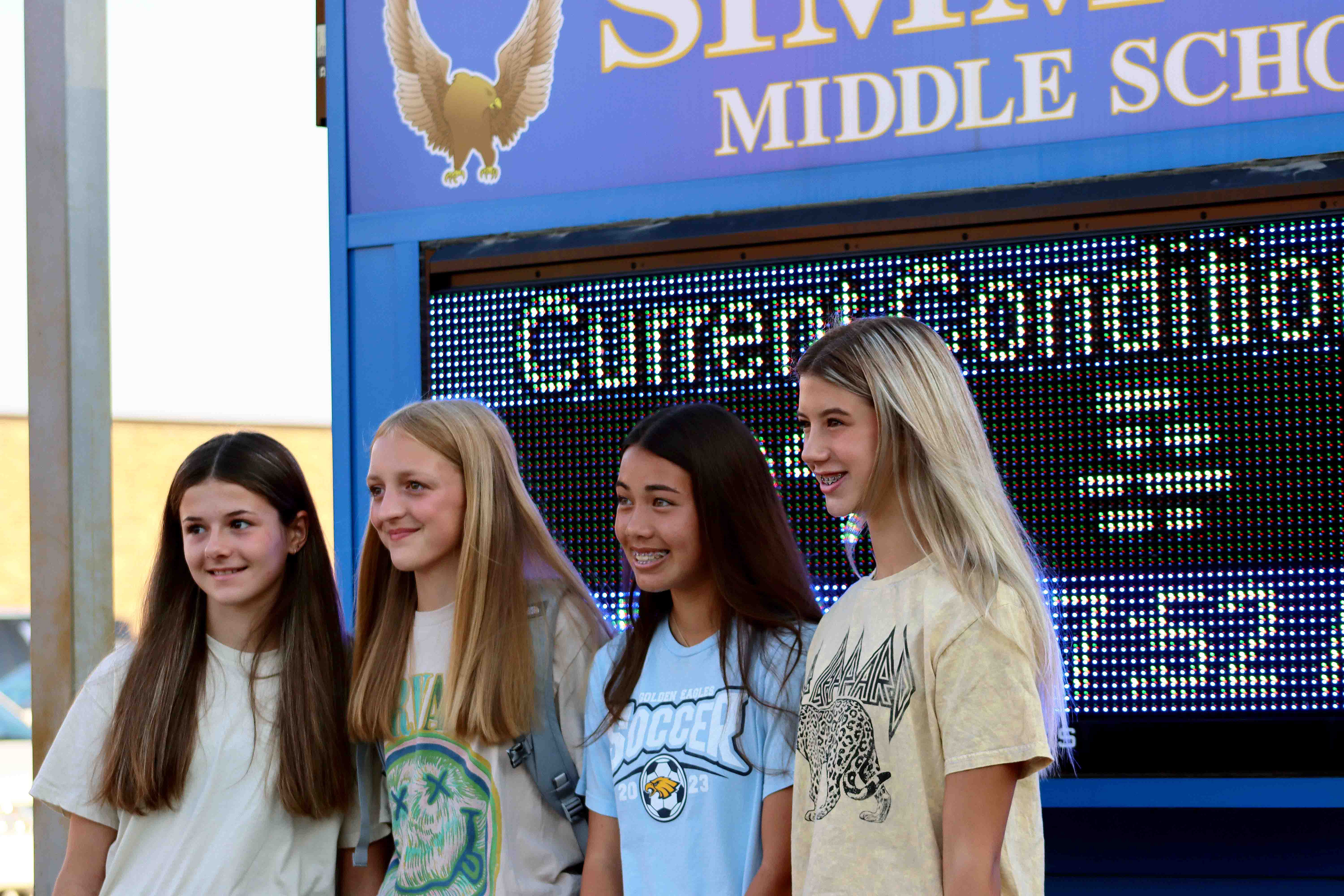 Students standing at school