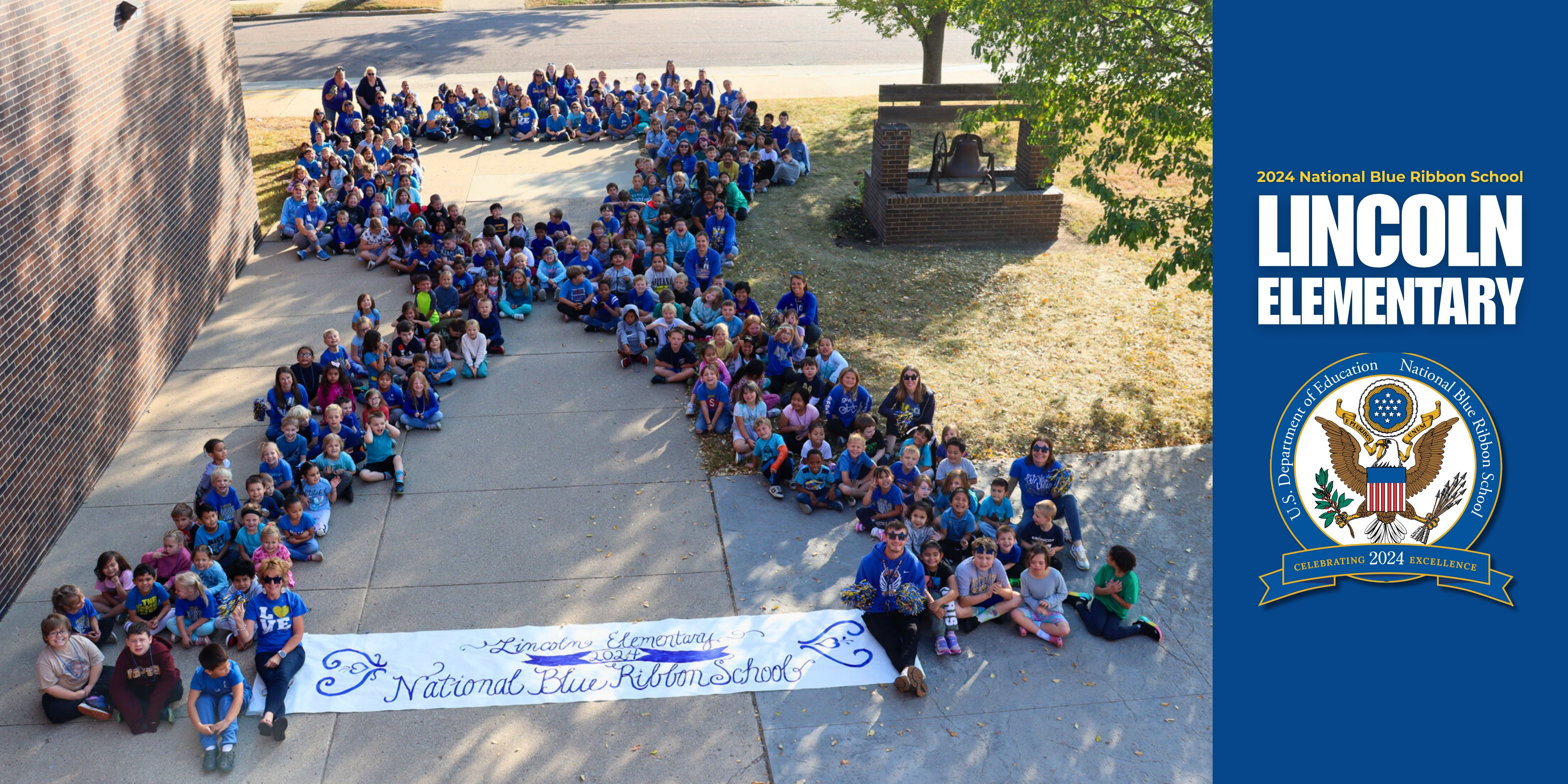 Lincoln Elementary students and staff forming a large blue ribbon