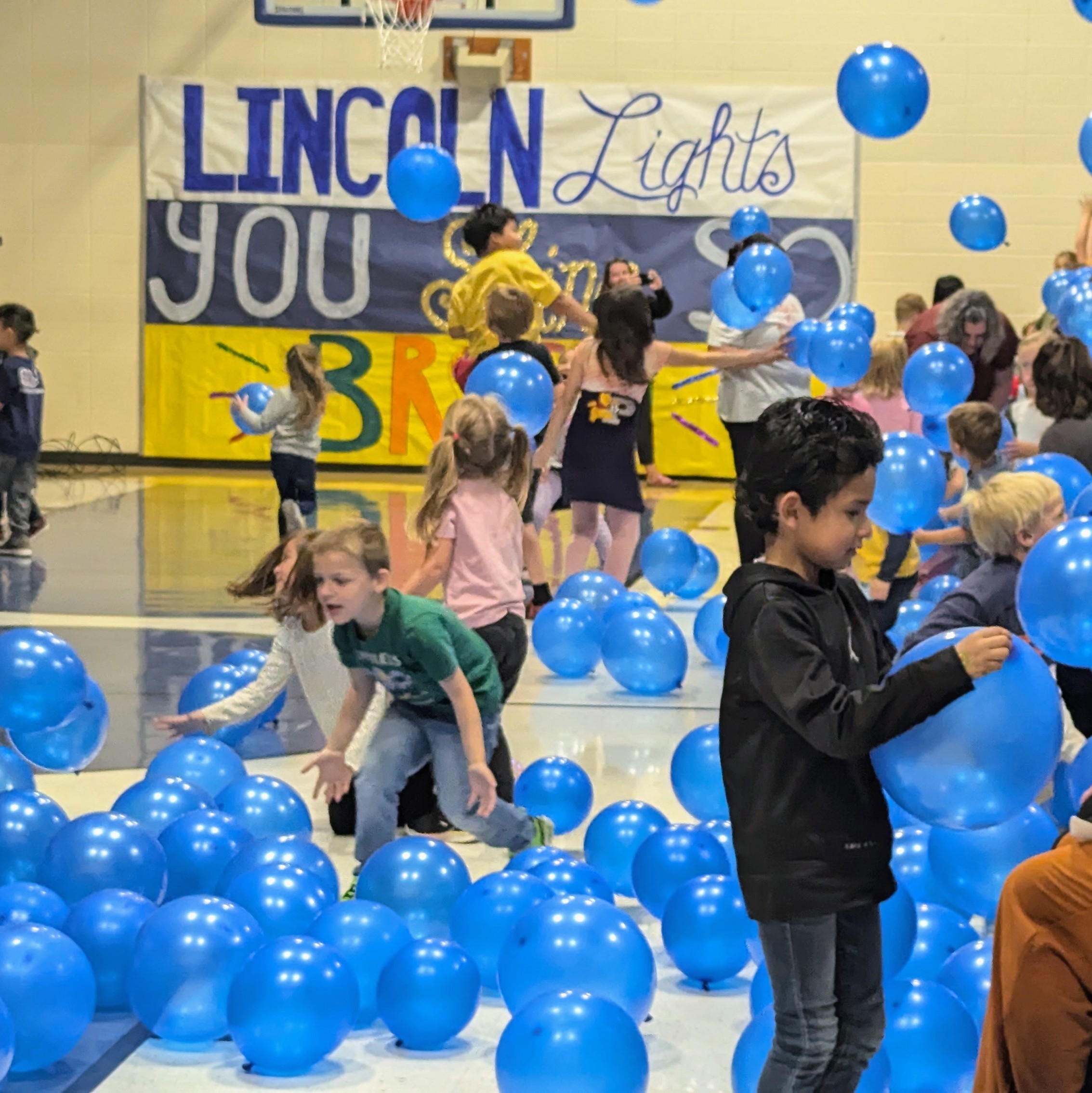 Students playing with balloons