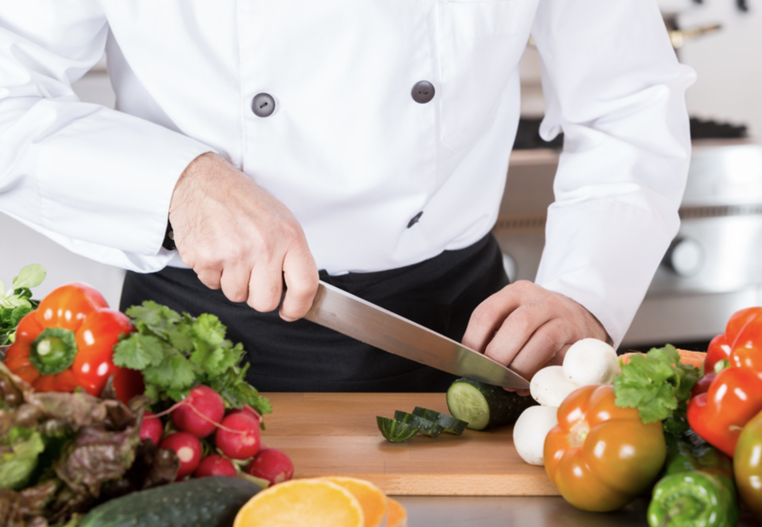 chef carving cucumber