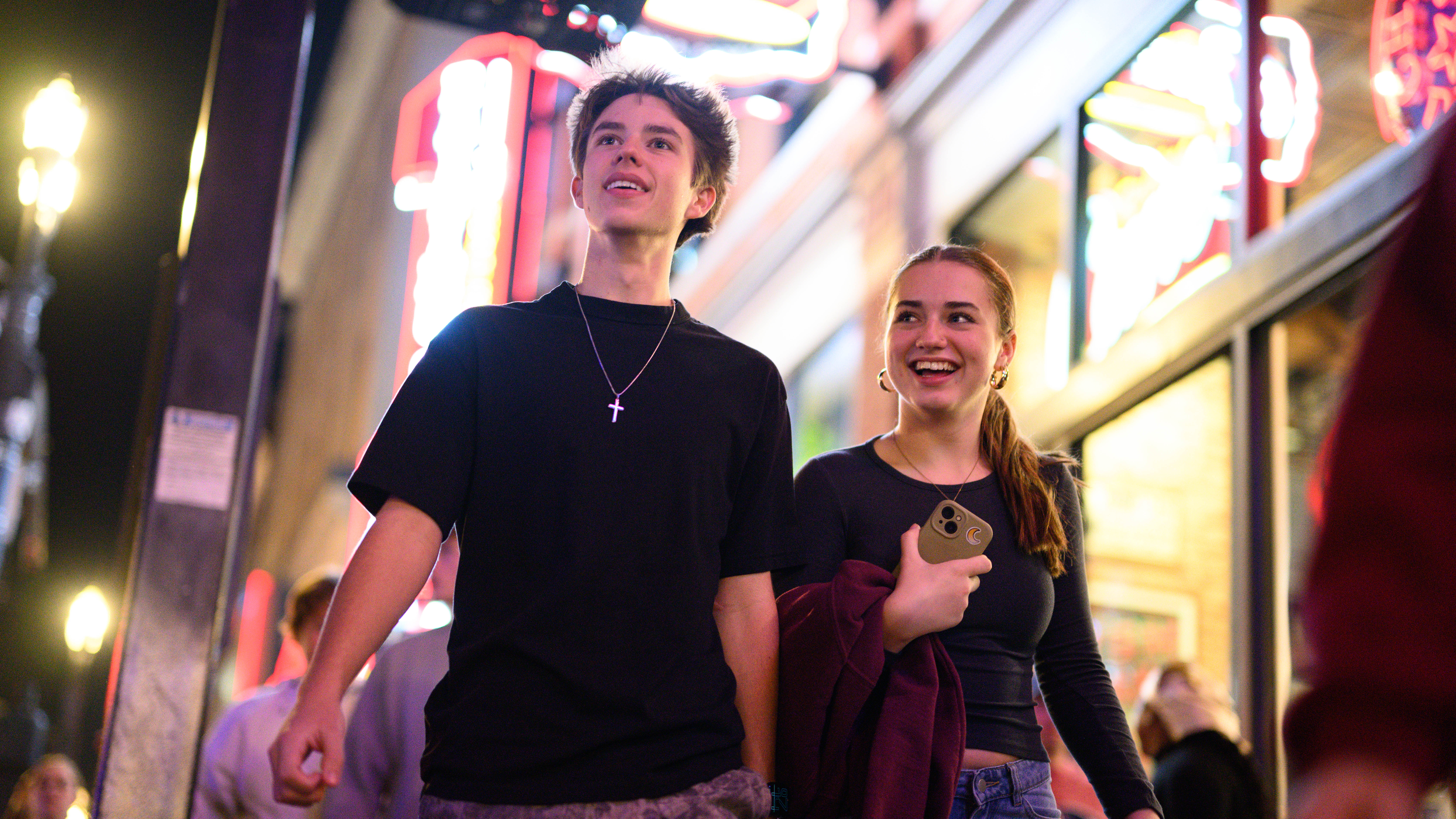 Two students explore the neon lit streets of Nashville.