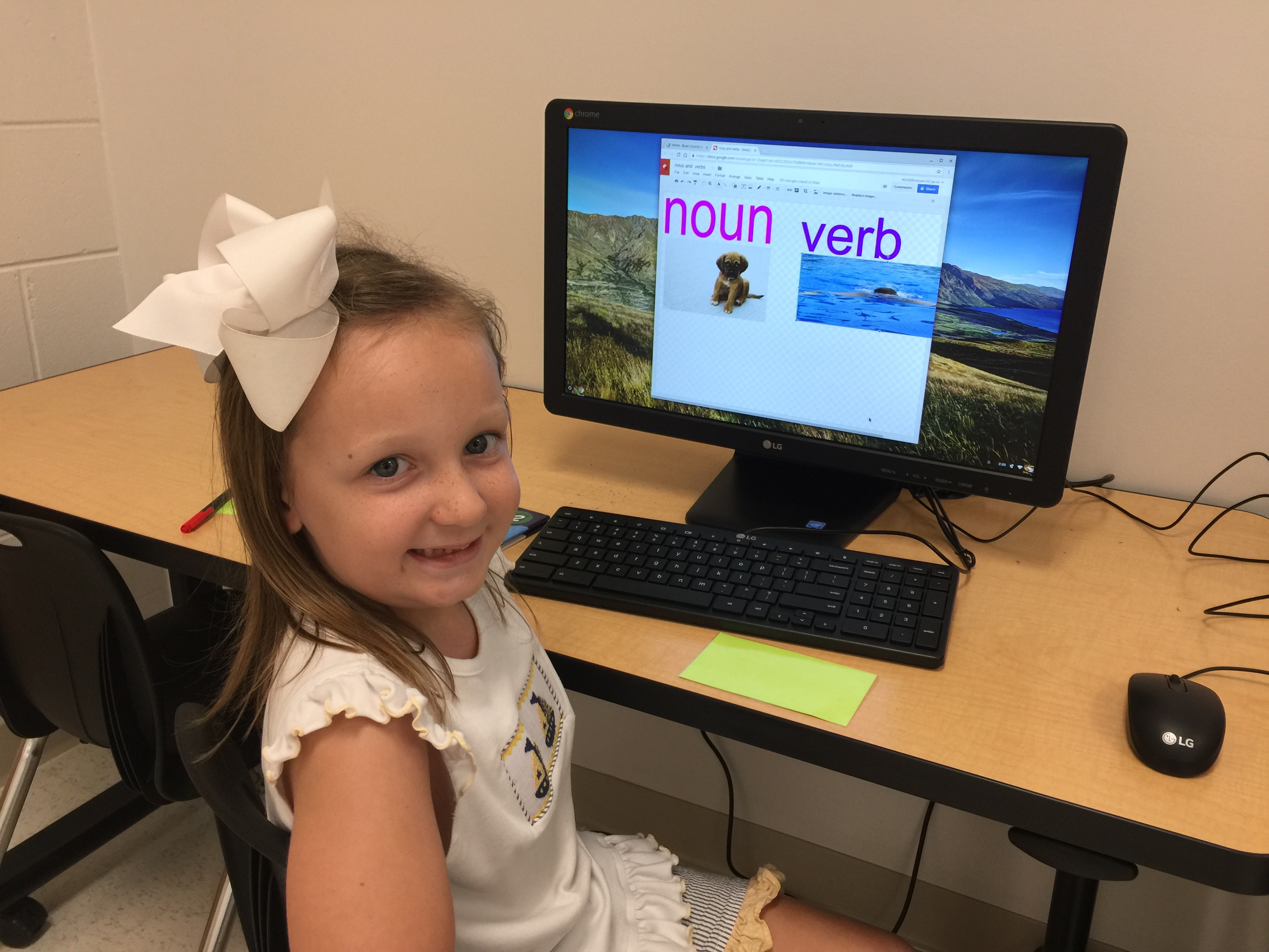 Girl student in front of a computer