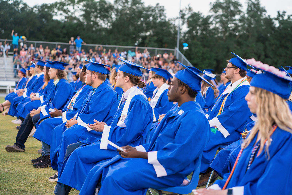 graduates sitting at ceremony