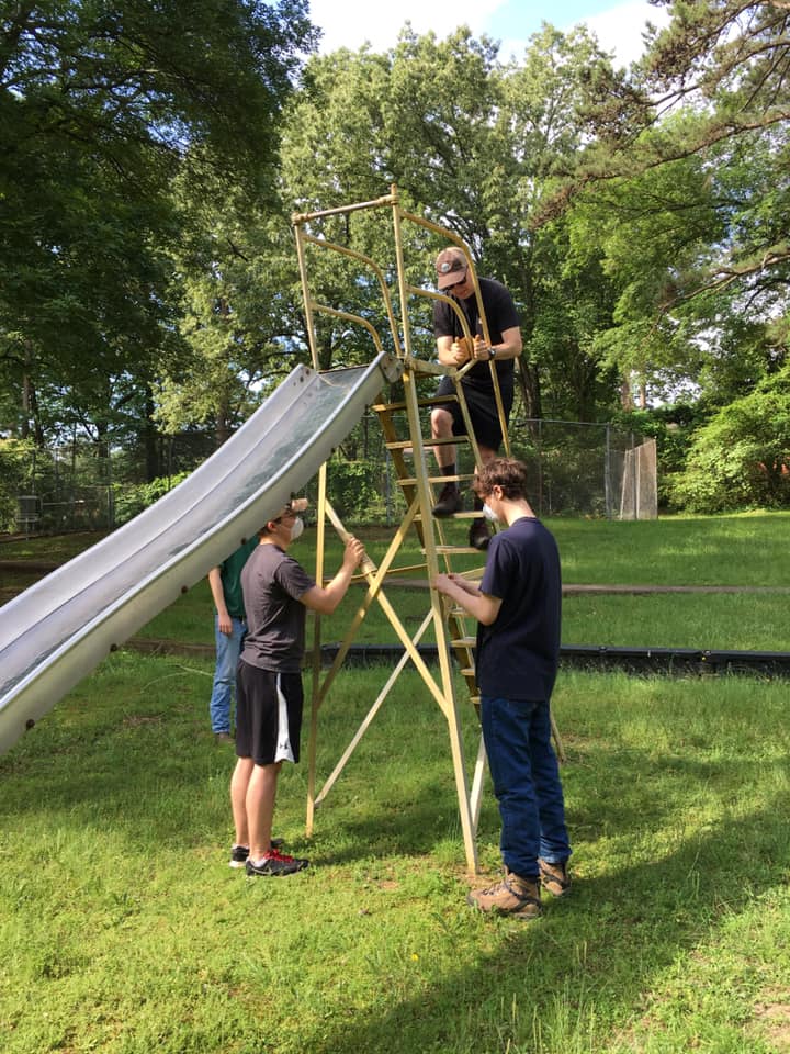 Eagle Scout Candidates repair Slide