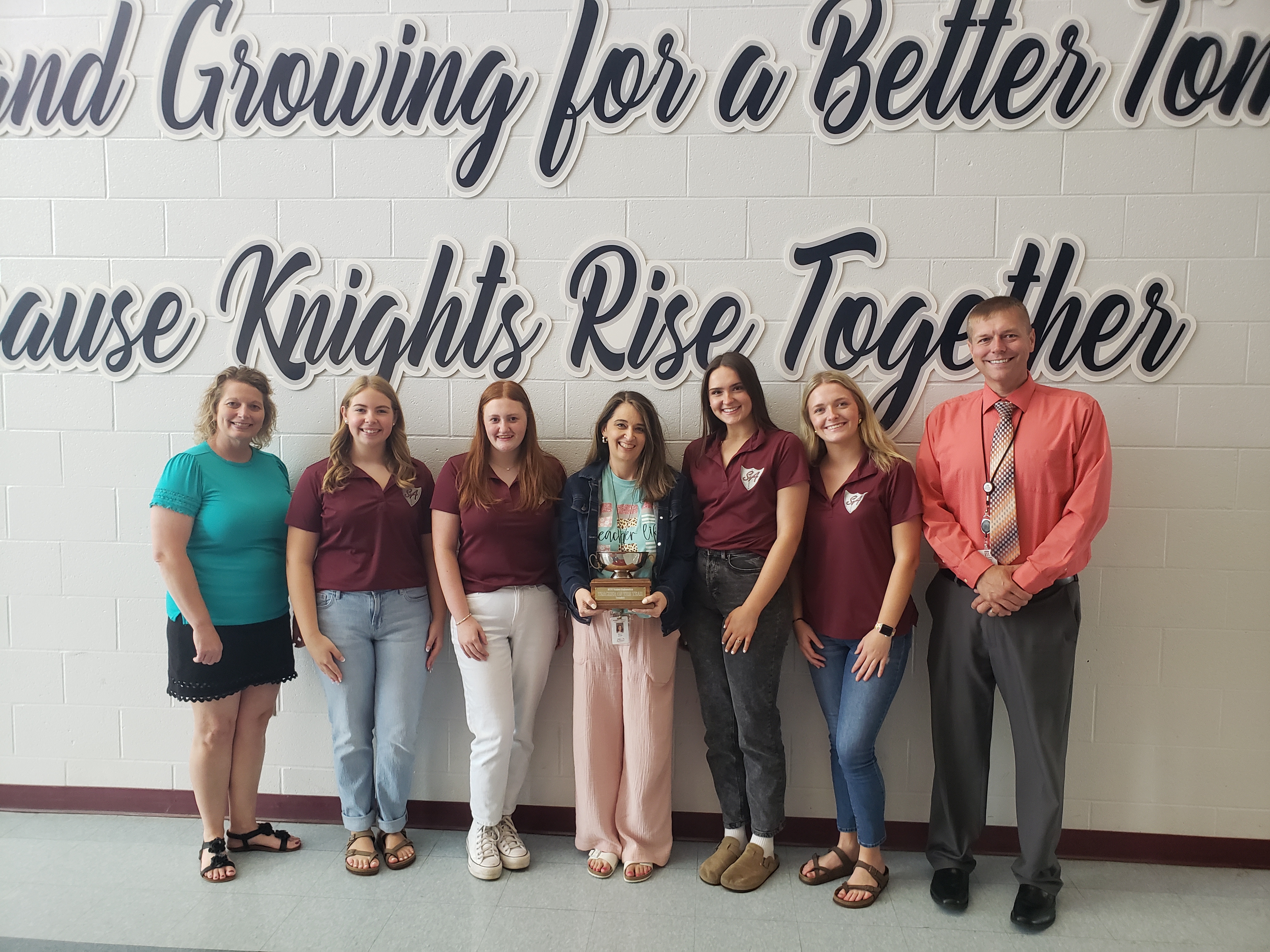 Teacher of the Year recipient with students