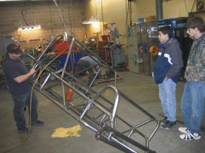 BOB lowering the chassis from the rafters for Ed and Casey