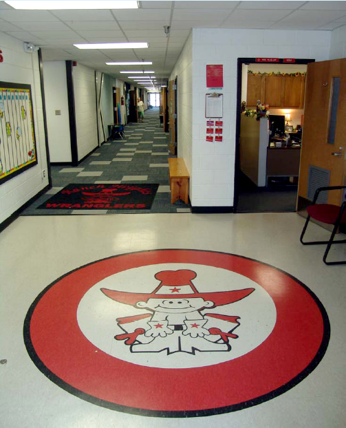 Wrangler floor logo at the south entry in 2009, which was formerly the school's main entrance