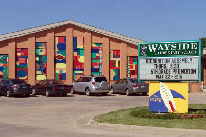 Gymnasium and signage in 2009