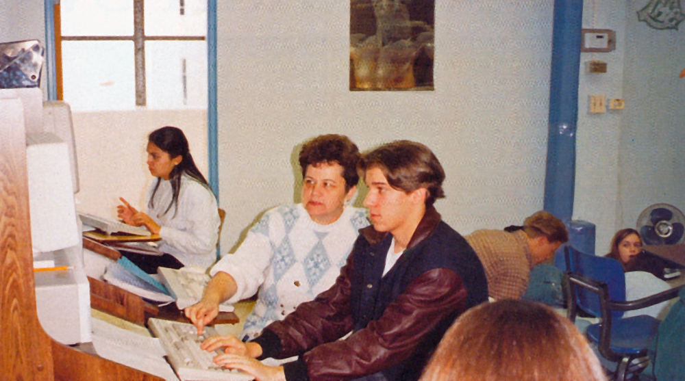 Diana Purser and student at computer