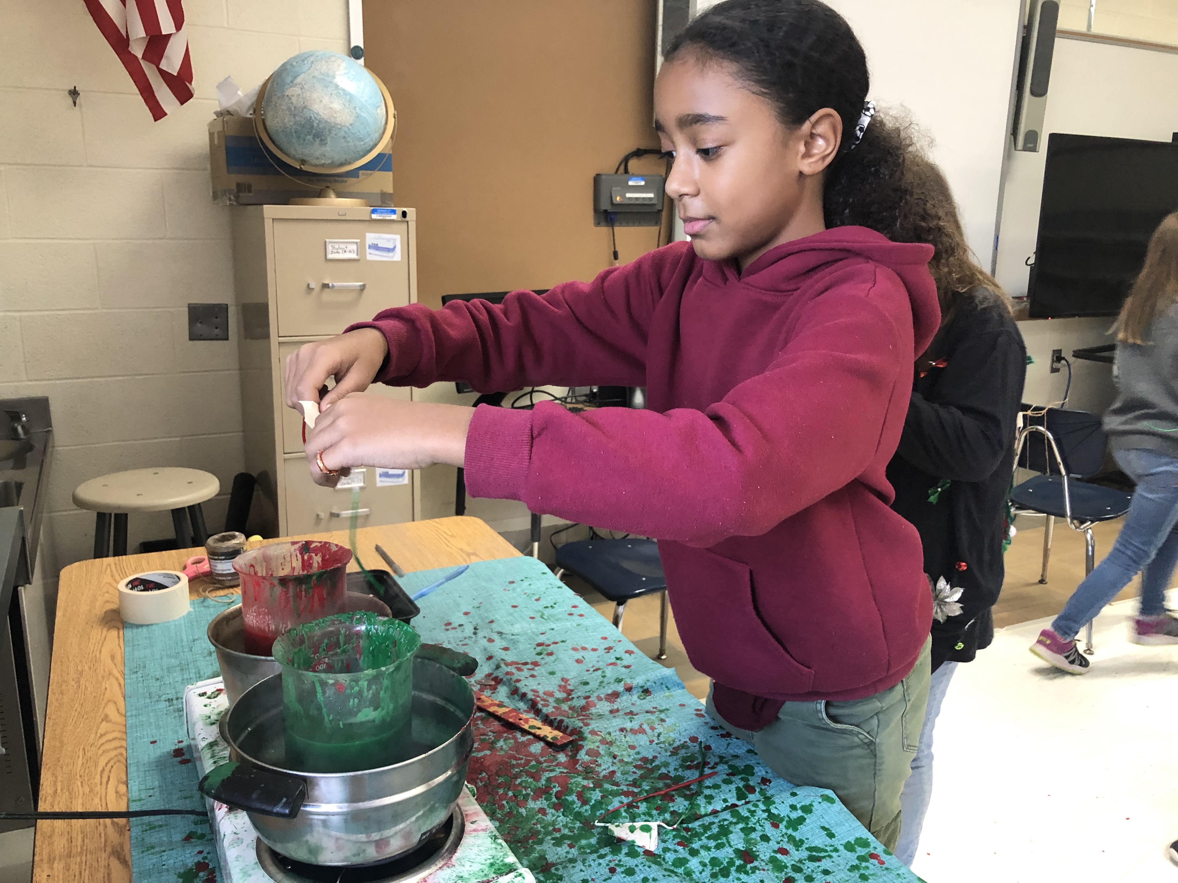 student working on a science project