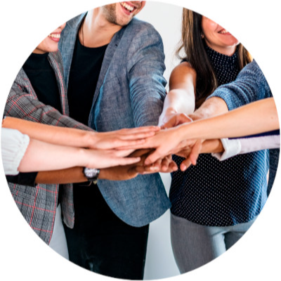 group of people in a circle cross hands using metaphor for partnership