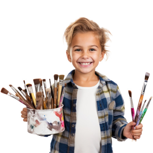 smiling student holding various painters brushes