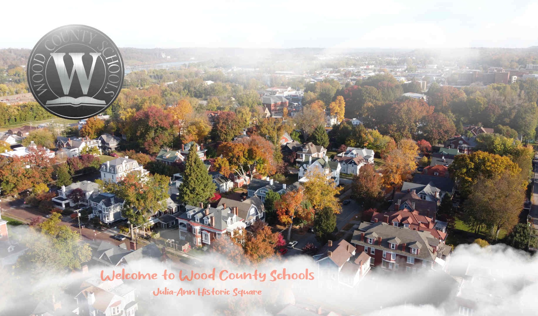 welcome to wcs - aerial view of julia-ann square in autumn with autumn-colored trees