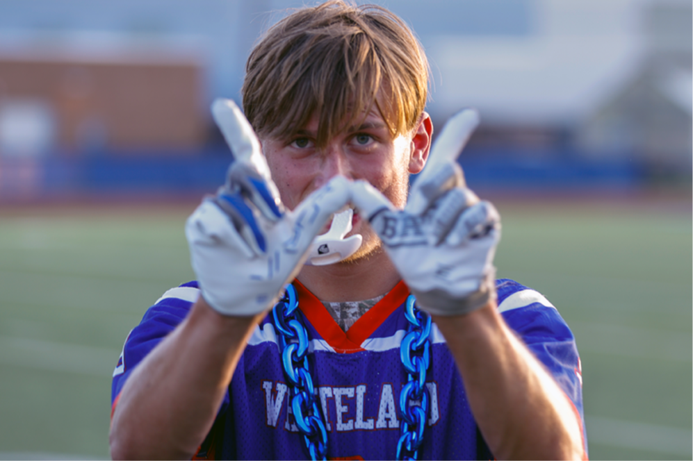 WCHS Athletics l Clark-Pleasant Schools  Football Player Flashes Winning Sign