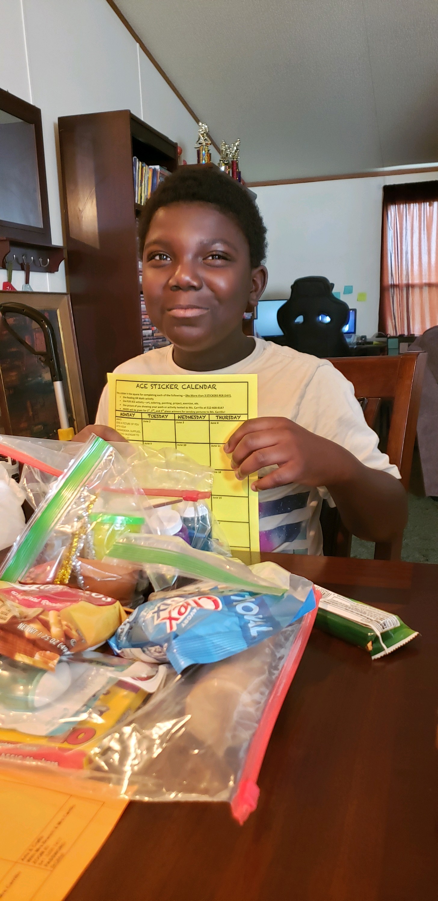 Boy with Snacks and Calendar