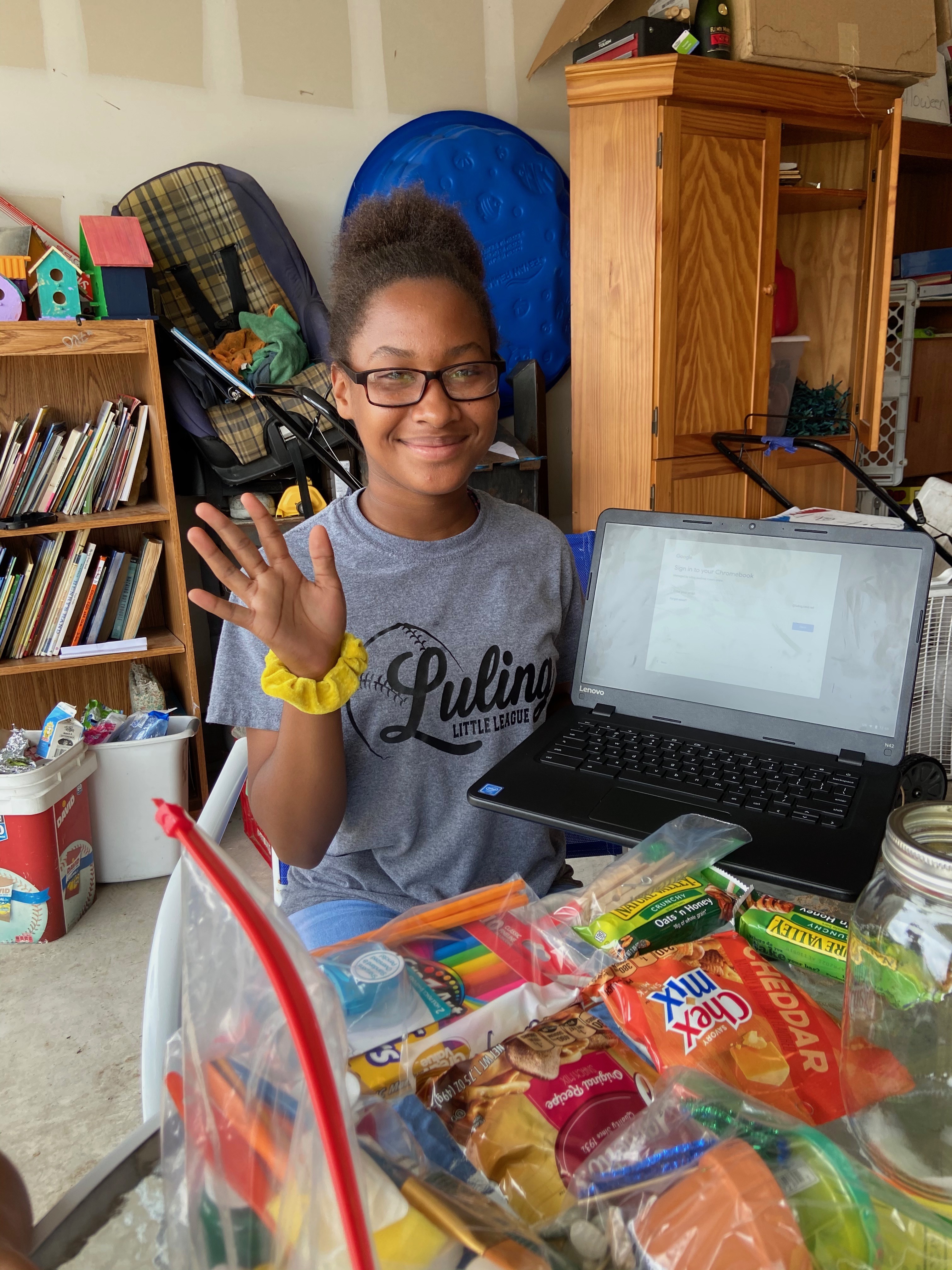 Girl with Computer and Snacks