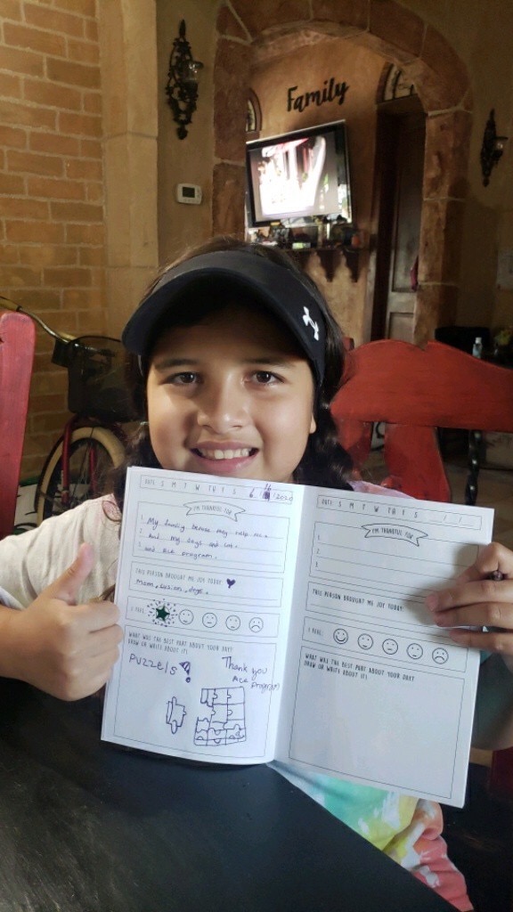 student with journal