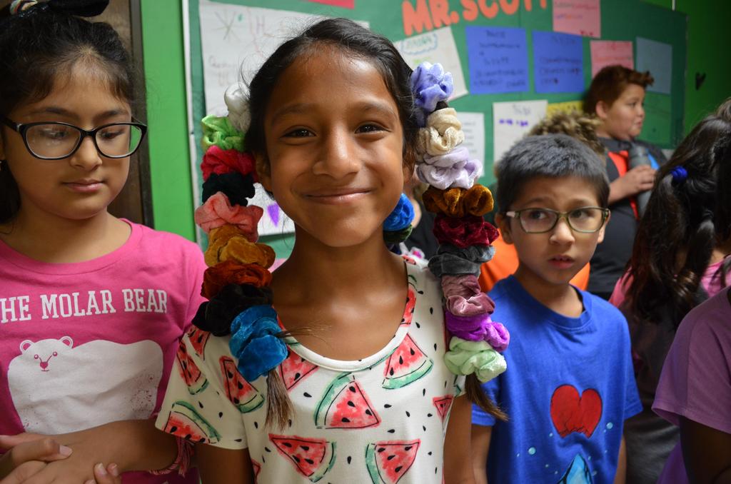 Series of photos of the Homecoming Spirit Day, Crazy Hair Day. The students all presented a series of crazy hair do's.