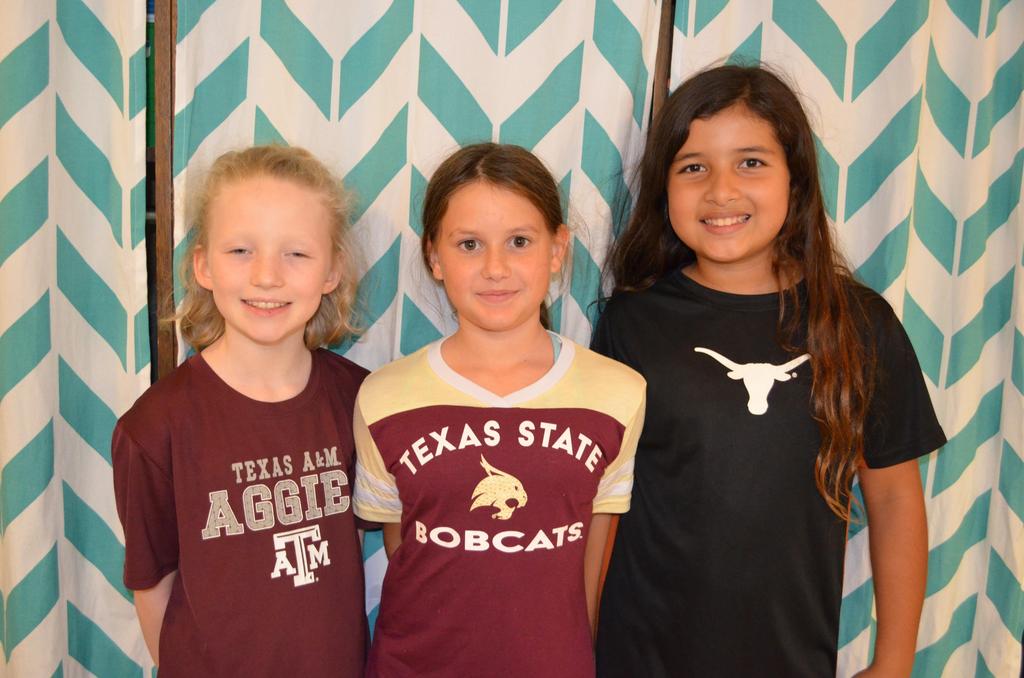 Photos of the National College Colors Day. The students wearing the college's jersey.