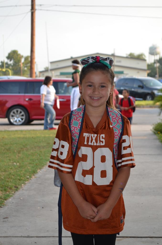 Photos of the National College Colors Day. The students wearing the college's jersey.