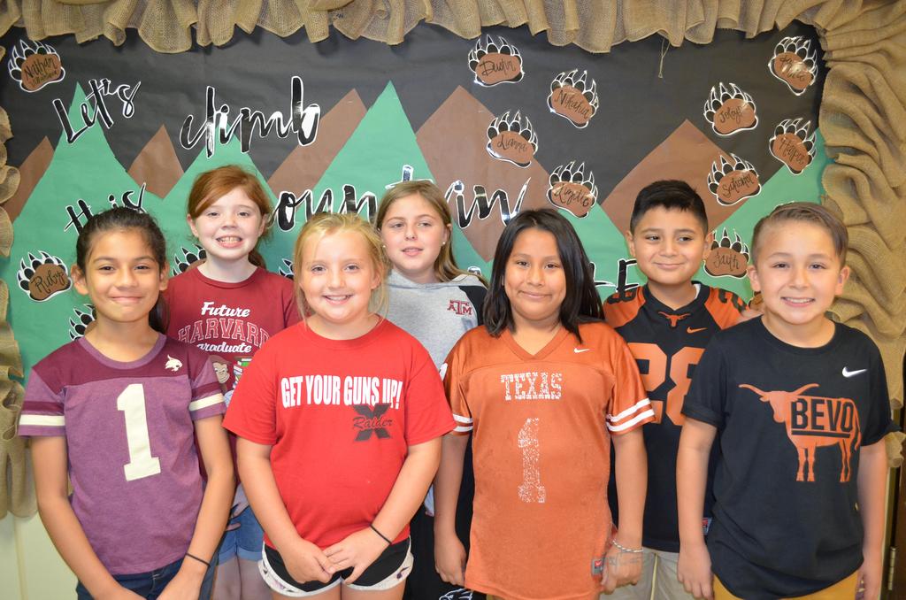 Photos of the National College Colors Day. The students wearing the college's jersey.