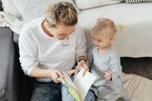 Mom reading to her child