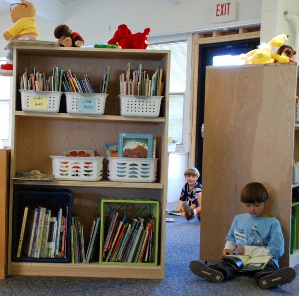 A photo of the library with some students reading.