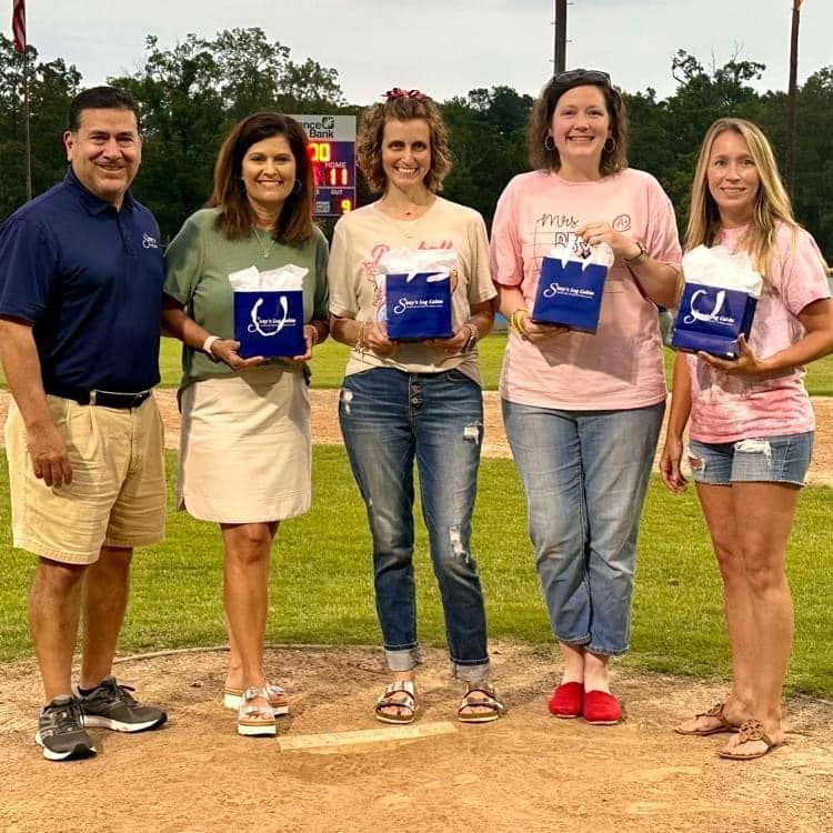 picture of teachers recognized at baseball game