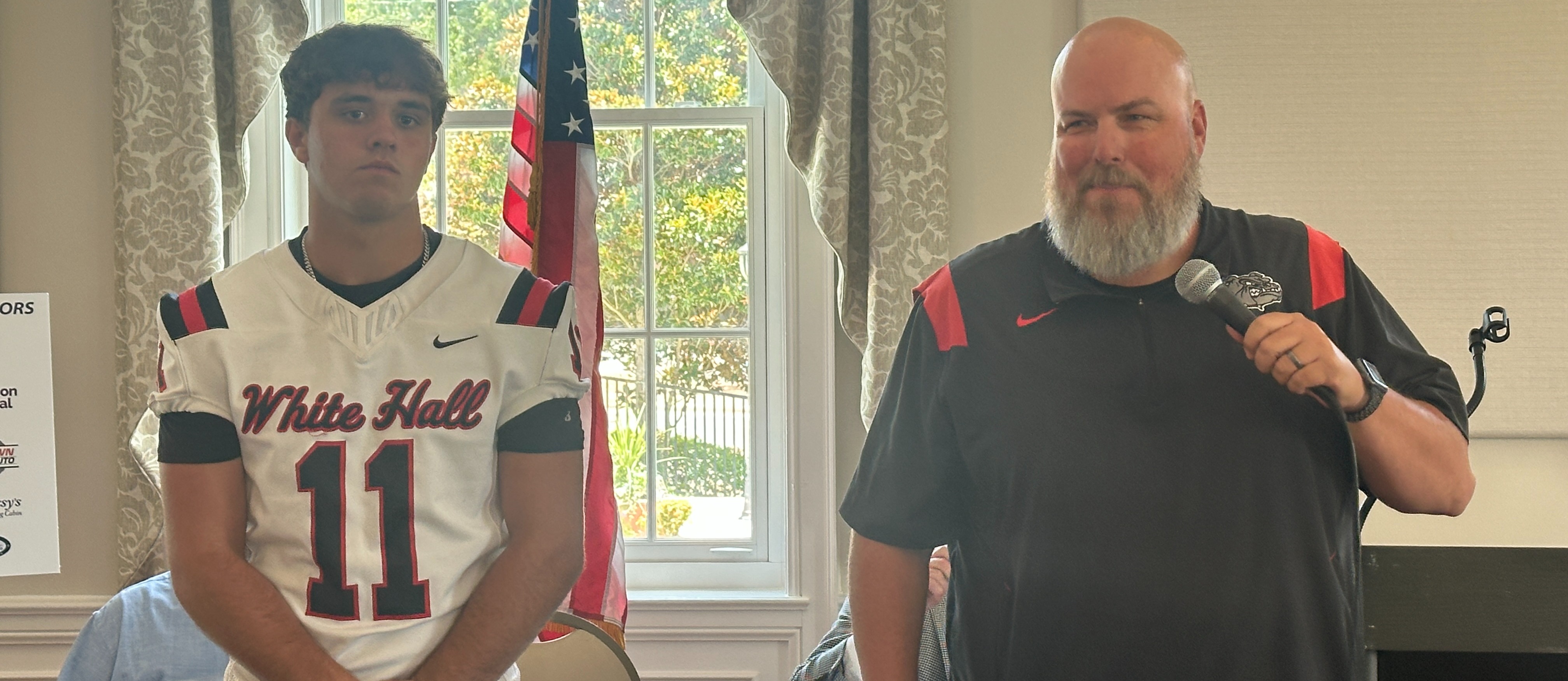 Coach Jason Mitchell and Senior Kel McEntire represented the Bulldogs at Hooten's Football Classic.