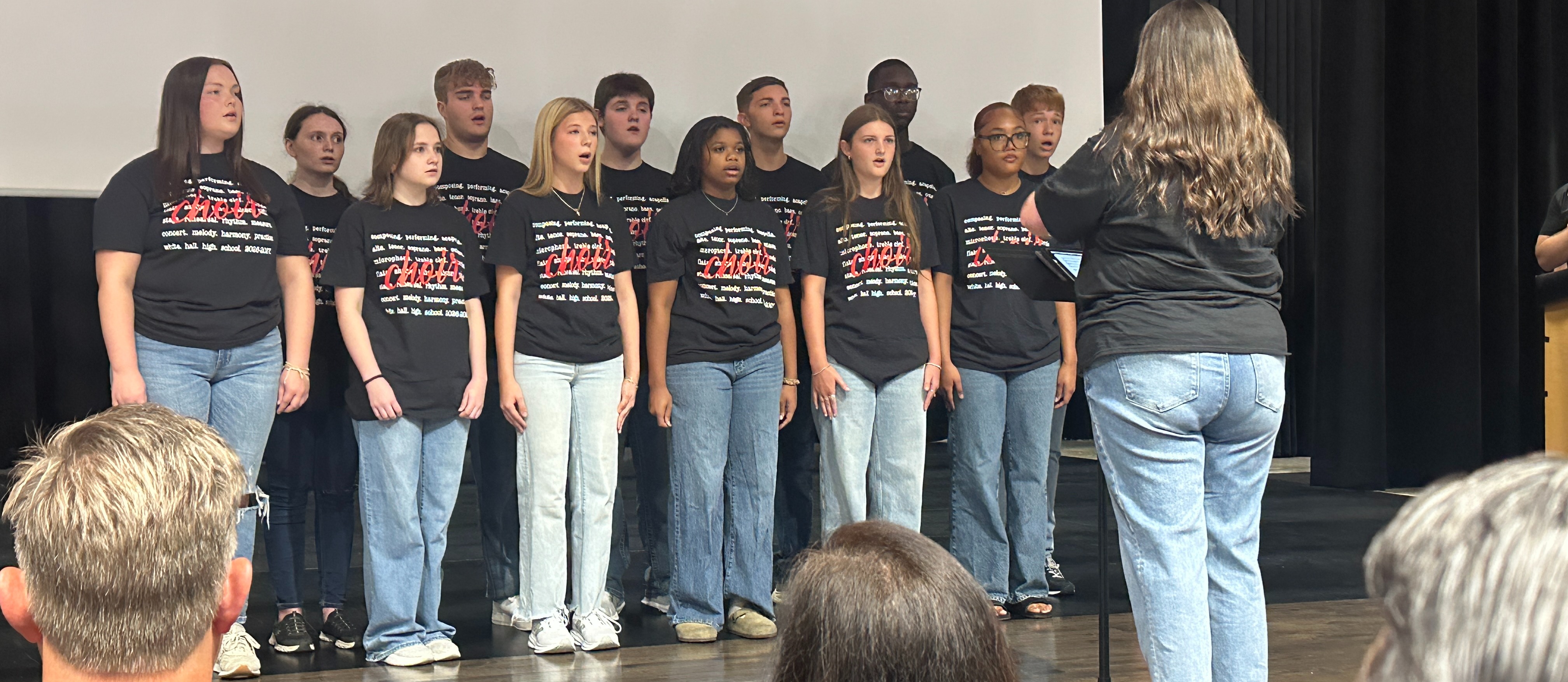 WHHS Chamber Choir performing during professional development. 