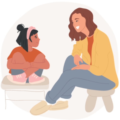 Woman talking to girl while sitting