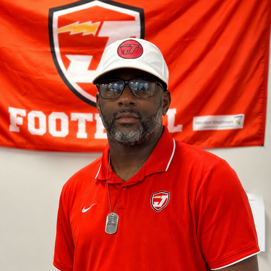 photo of head football coach reggie swinton