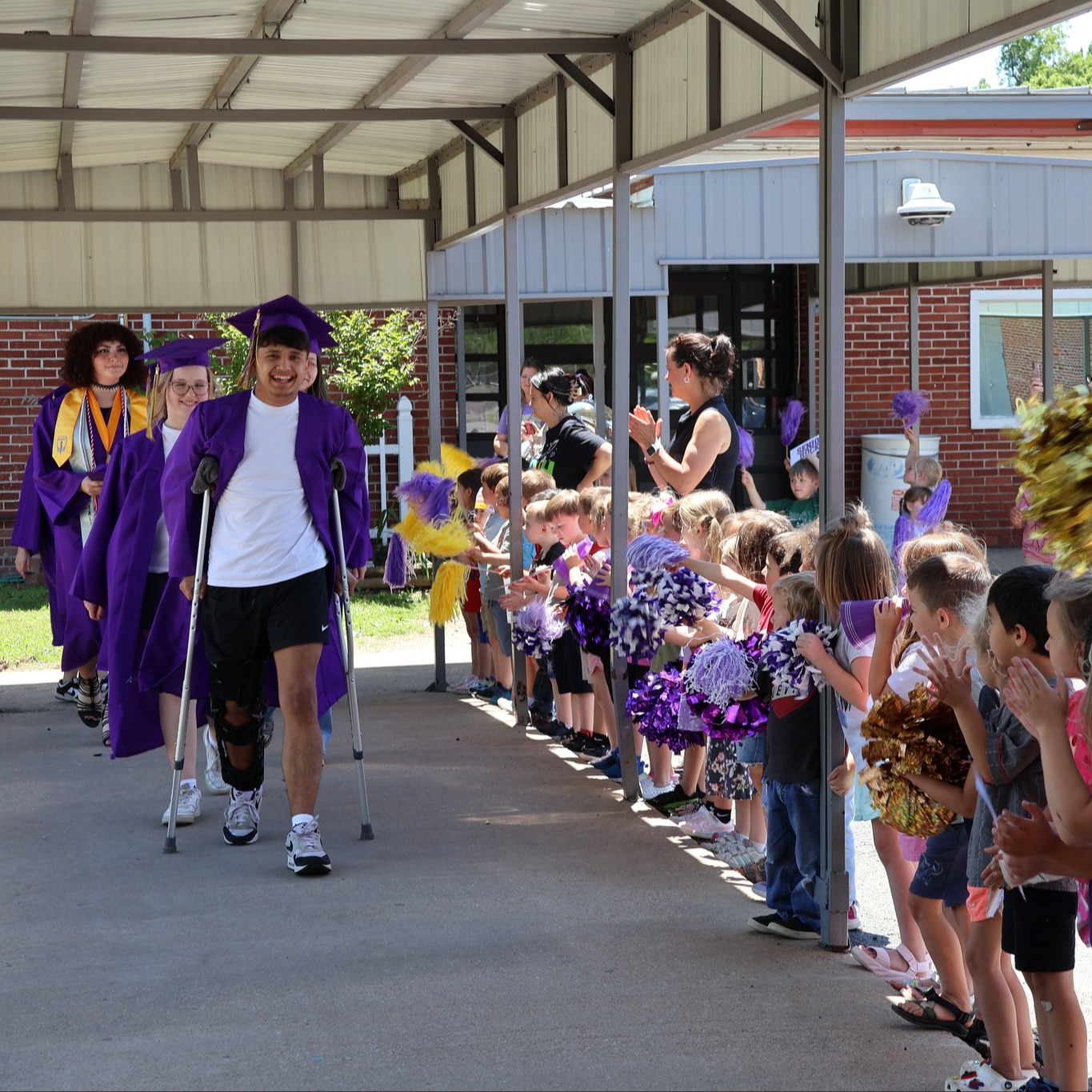pre-k seeing senios walk through