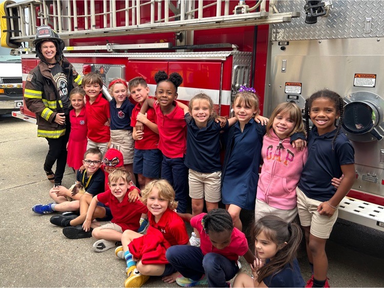 Students by a firetruck