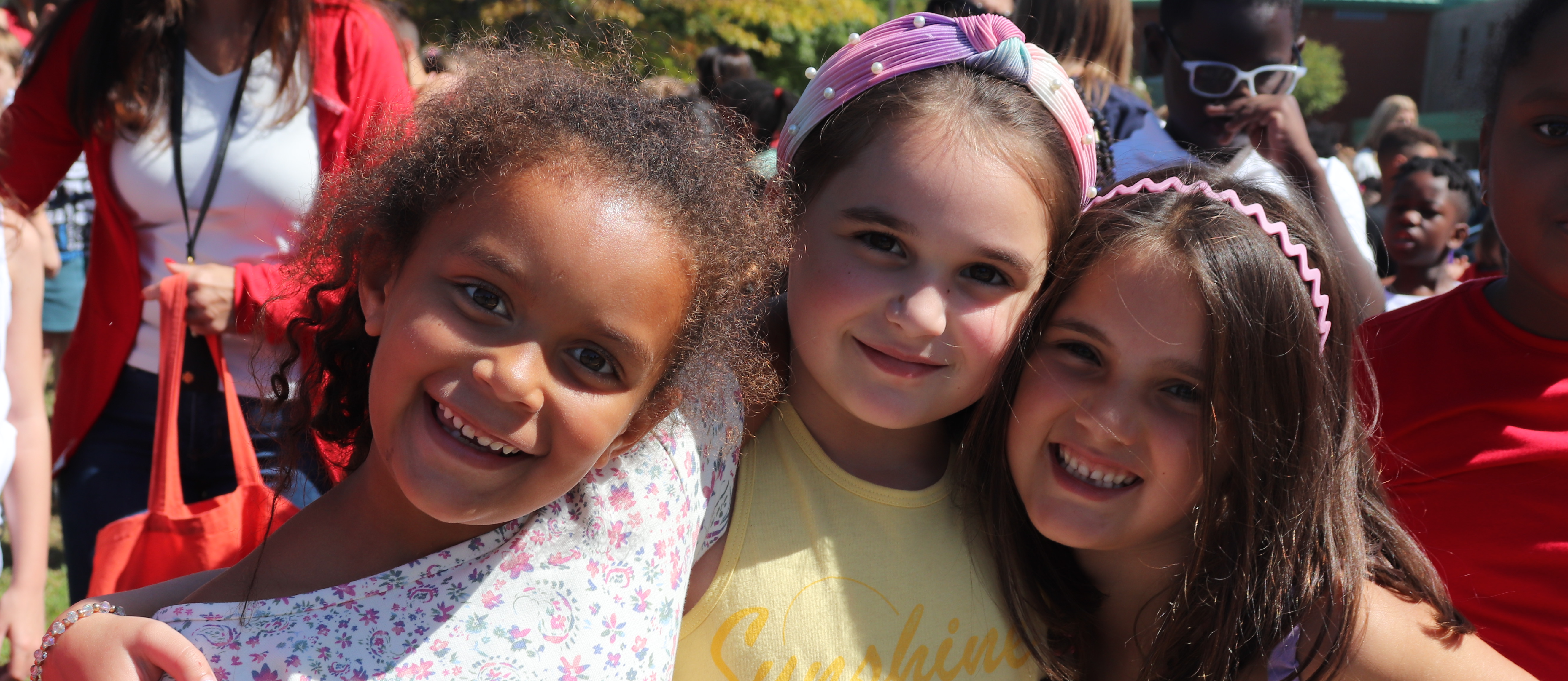 Three girls posing