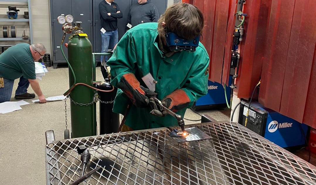 student welding