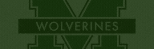 Green background with the word "Wolverines" in white text at the center, part of a logo.