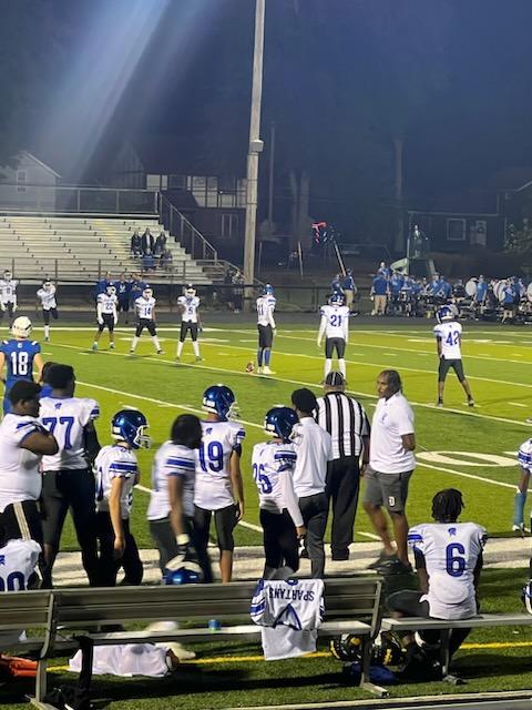 Photo of Spartan Football players on the field