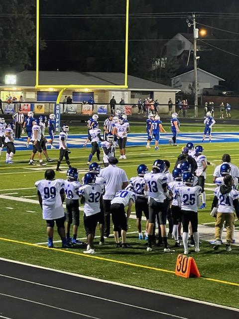 Photo of Spartan Football players on the field