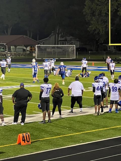 Photo of Spartan Football players on the field