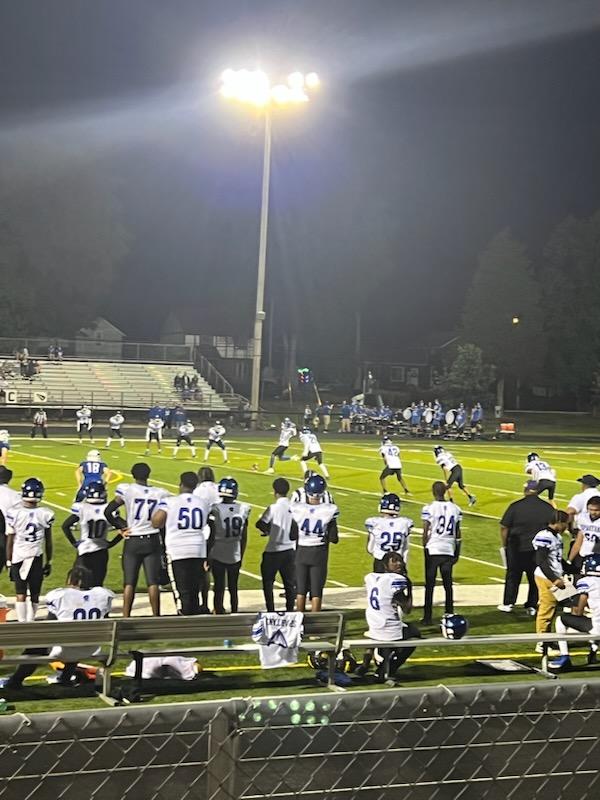 Photo of Spartan Football players on the field
