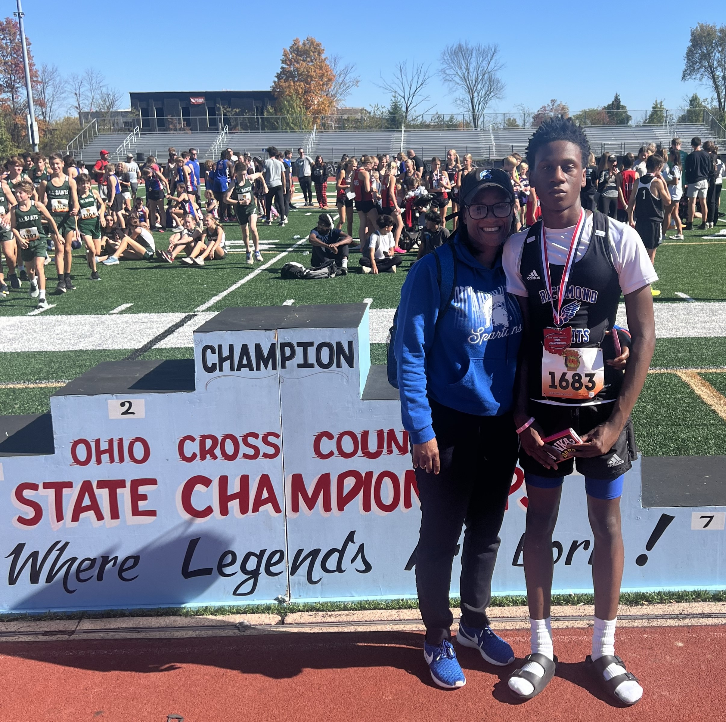 female with male track athlete