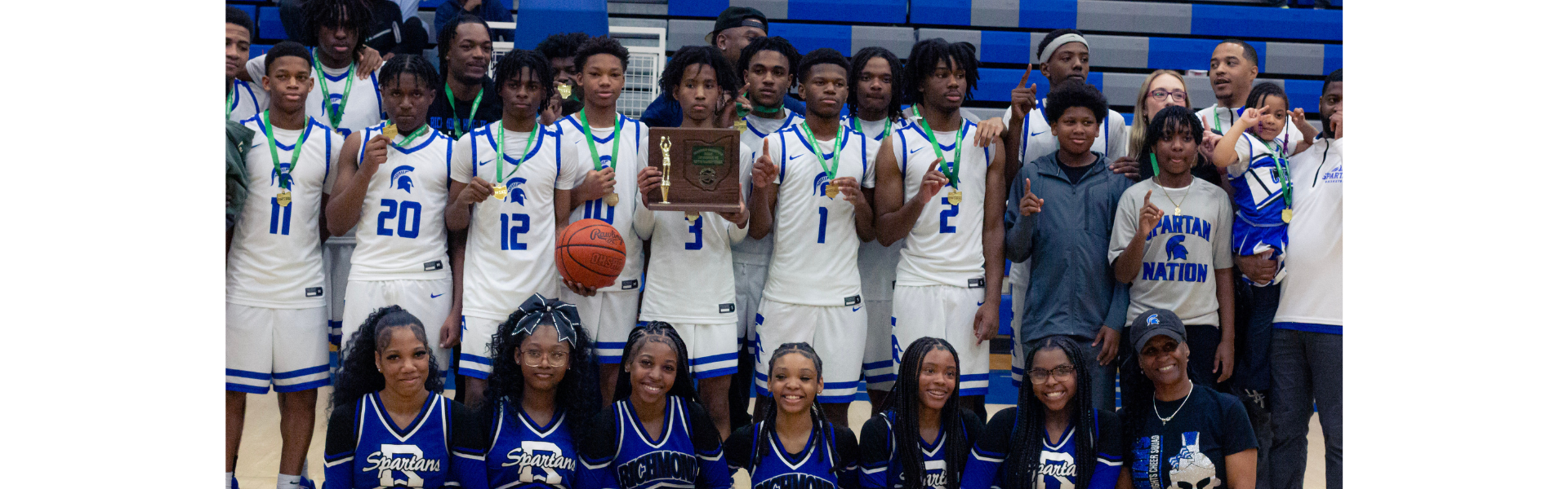 boys basketball team and cheerleaders