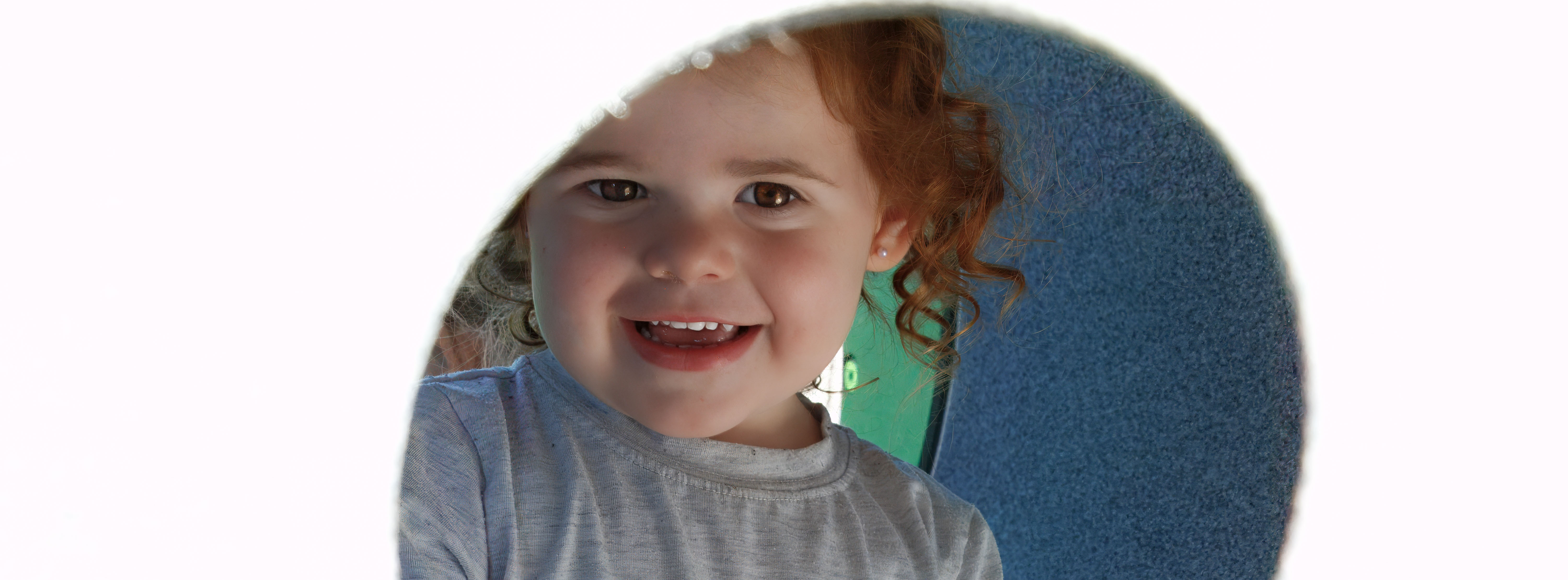 Preschool Toddler Peeking through equipment