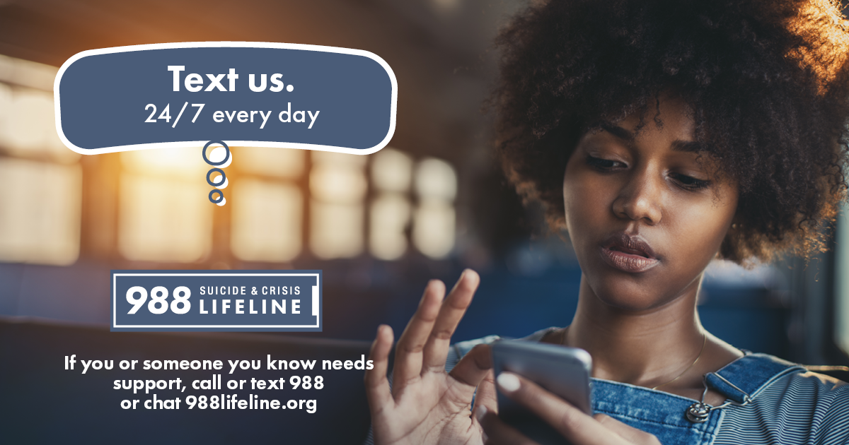  Graphic with a photo of a young Black woman seated alone on an empty bus texting on her smartphone, with text “Text us 24/7 every day. 988 Suicide & Crisis Lifeline. If you or someone you know needs support now, call or text 988 or chat 988Lifeline.org.”