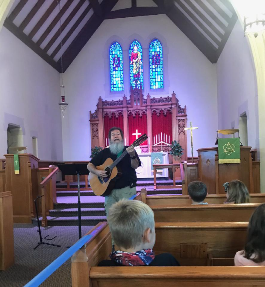 Pastor Miille leading chapel