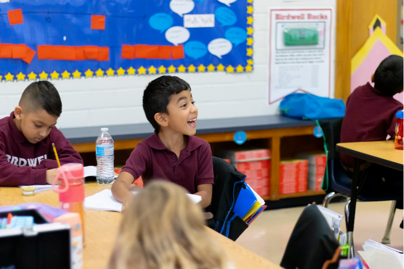 student excited to be in class